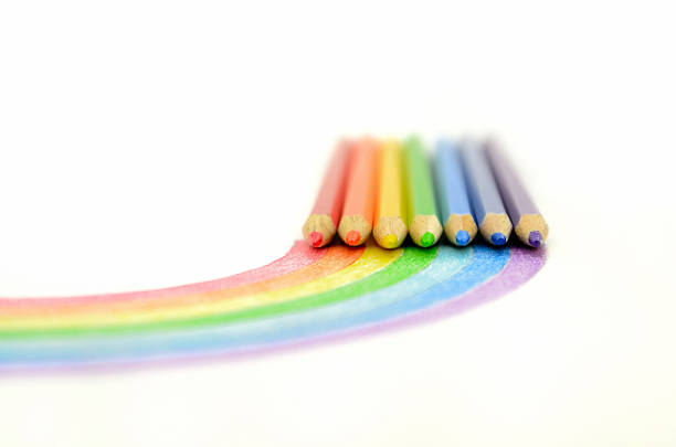 istock Colored pencils with hand drawing of rainbow 503619704