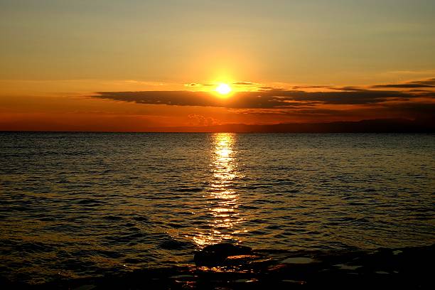 istock The seaside of the beautiful setting sun 503621086