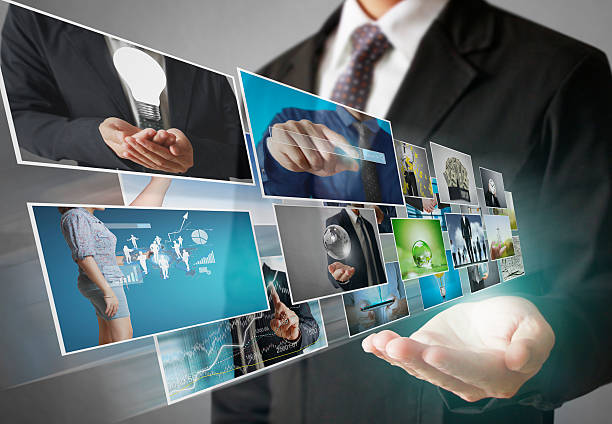 istock businessmen and Reaching images streaming 503621434