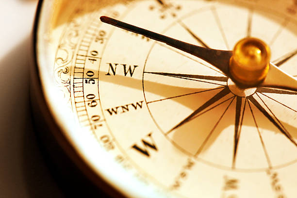 istock Close up of needle on directional compass 503621569