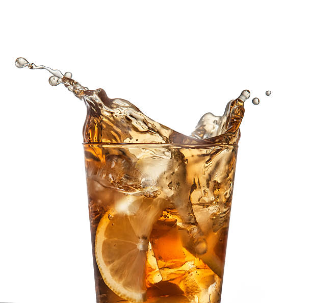 istock splashing iced tea with lemon 503624529