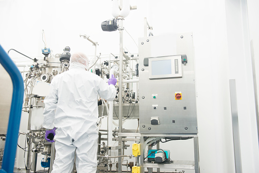 Pharmaceutical scientist working in an aspeptic or sterile or clean room