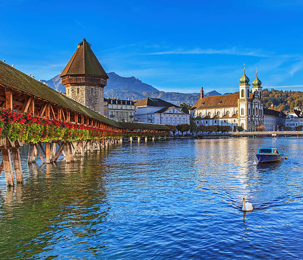 Morning in Lucerne View on the Reuss river in Lucerne, Switzerland in autumn morning. lucerne switzerland stock pictures, royalty-free photos & images