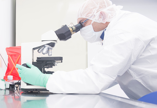 Pharmaceutical scientist working in an aspeptic or sterile or clean room