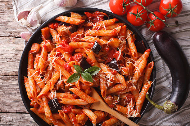 istock Pasta alla Norma close-up and ingredients. horizontal top view 503626496