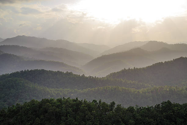 istock the layer of moutain with sun light 503627079
