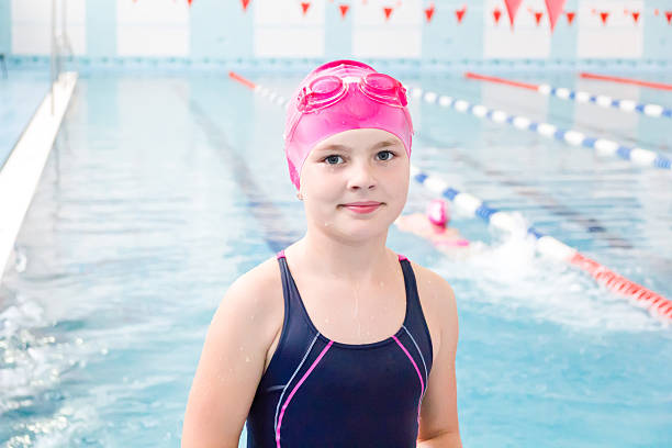 istock Cute girl in swimming pool 503628643
