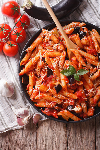 istock Italian food: Pasta alla Norma close-up and ingredients. vertica 503632738