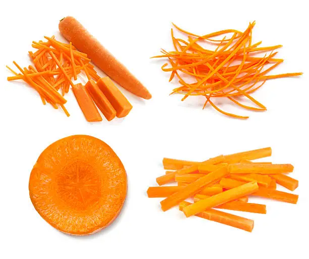 Carrots collection isolated on white.  Whole and cut, sticks, slices, and julienned.