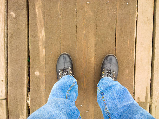 istock Feet on the wooden floor. 503634692