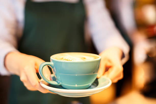 istock portrait waitress and waiter in cafe 503635056