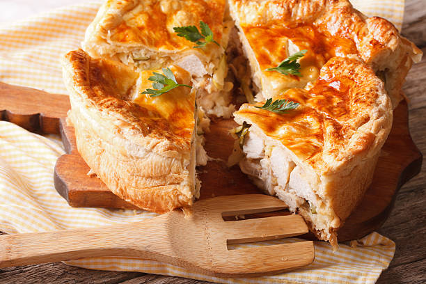 istock Homemade chicken pie sliced close-up on the table. Horizontal 503635428