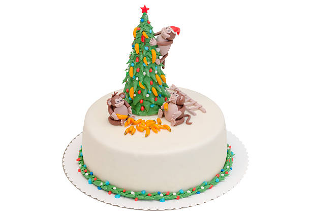 christmas cake 2016 with happy monkey, bananas and tree isolated