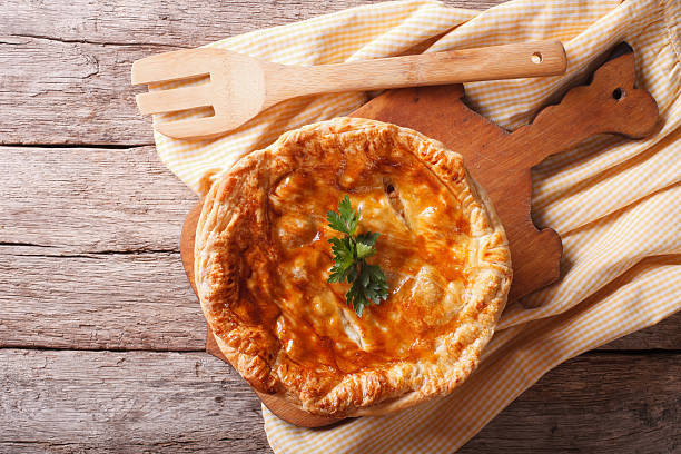istock Homemade chicken pie close-up on the table. horizontal top view 503636420