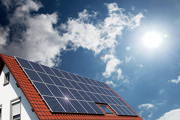 Solar panels on house roof Solar panels on house roof solar power station solar panel house solar energy stock pictures, royalty-free photos & images