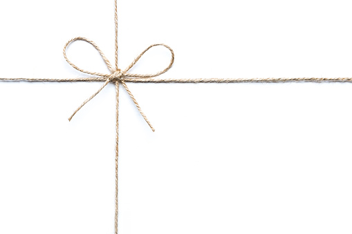 twine tied in a bow isolated on white background