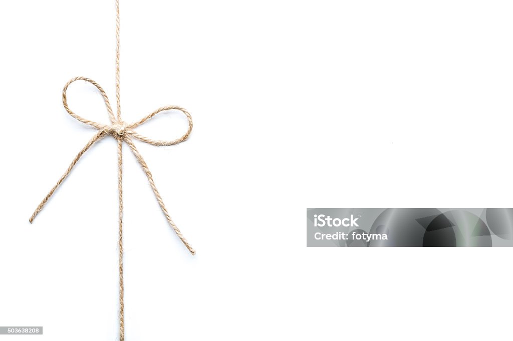 twine twine tied in a bow isolated on white background String Stock Photo