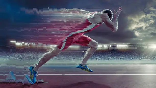 A heavily manipulated and distorted semi abstract image of a professional male sprinter bursting away from starting blocks on an outdoor running track. The action takes place in a generic outdoor athletics floodlit stadium full of spectators under cloudy evening sky at sunset.  The athlete is wearing a generic strip. 