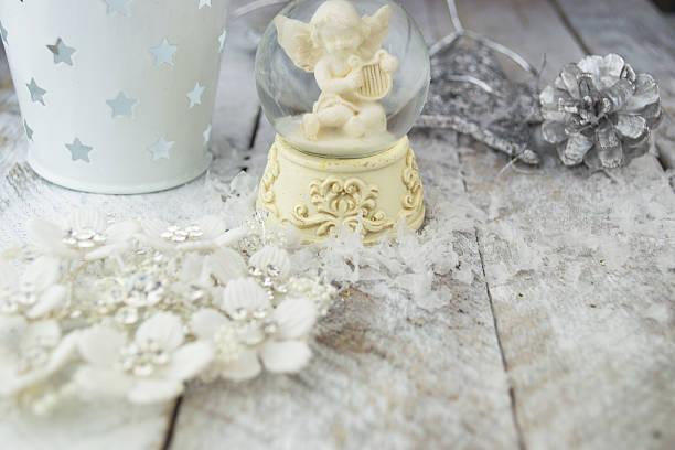 istock Christmas angel statuette on silver background 503644572