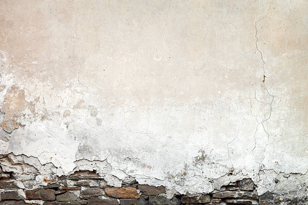 бетонная стена - textured textured effect stone plaster стоковые фото и изображения