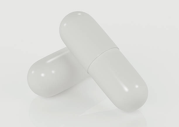 istock White capsules, healthcare concept. 503654450