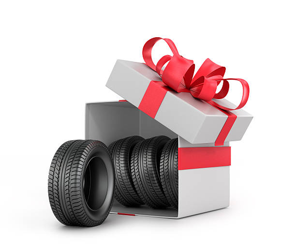 istock White Gift Box with car tires. 503654864