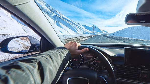 istock view from car on winter asphalt road  bright sunny day 503656016