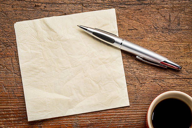 napkin, pen and coffee stock photo