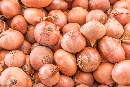 Onions in farmes market closeup high angle