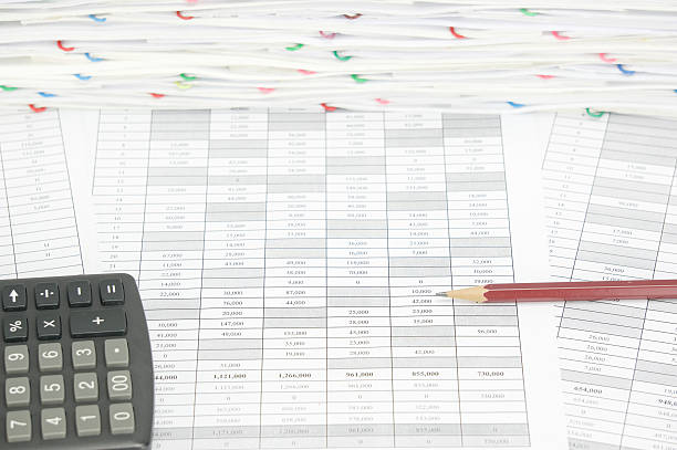 istock Brown pencil on finance account with calculator 503661846