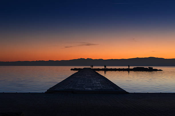 istock Great sunset colors in lake Ohrid 503662418