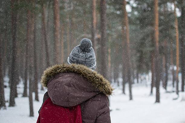 istock traveler in the snowy forest 503663346