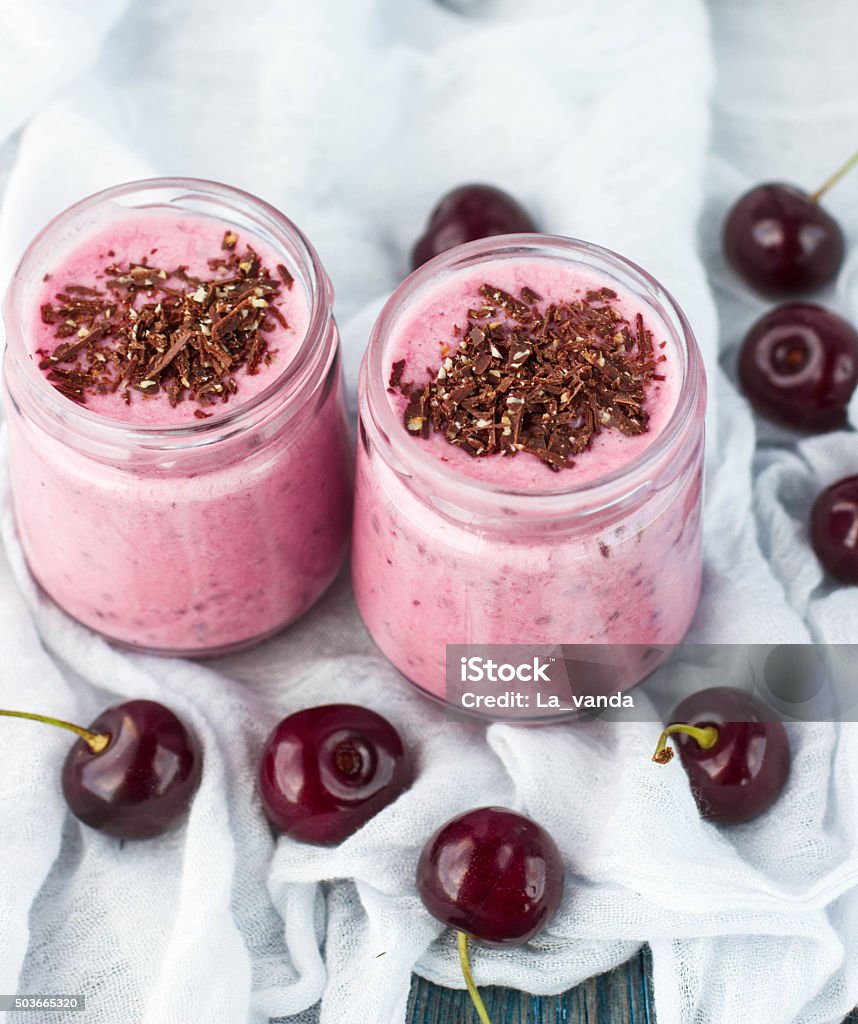 Smoothie with cherries, chocolate and nuts. Selective focus Smoothie Stock Photo