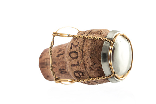 Cork from champagne bottle, isolated on the white background. Concept object for a celebration event or new yearâs eve 2016.