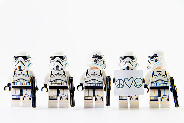 Stomtrooper want a peace Nonthaburi, Thailand - December 31, 2015: The lego Star Wars mini figures from movie series on isolated white background, Lego is an interlocking brick system collected around the world by adults and children. lego stock pictures, royalty-free photos & images