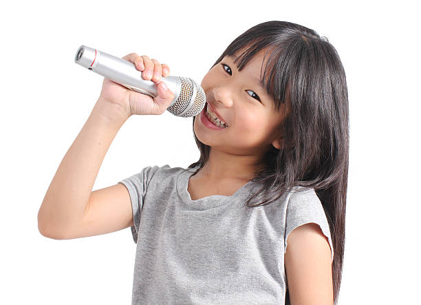 istock Cute girl singing 503669028