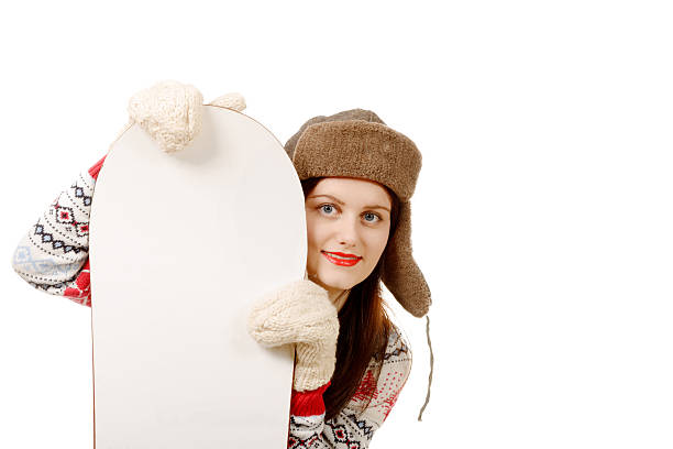 istock beautiful woman with a snowboard in studio 503669480