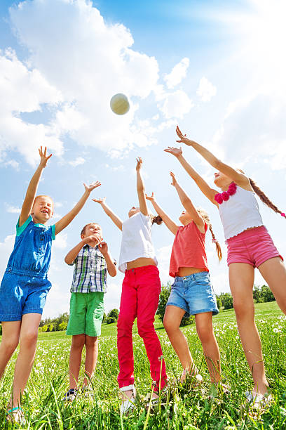 istock Children playing with a ball 503671175