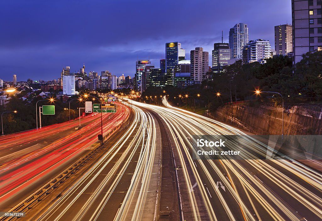Sy Cahill expressway wide sunset australia Sydney CBD view from over Cahill express way with lots of traffic at sunset with blurred lights Sydney Stock Photo