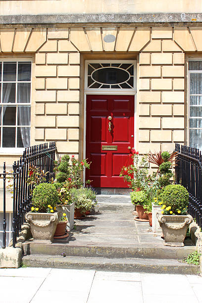 istock Image of red front door with Georgian surround, Bath stone 503677621