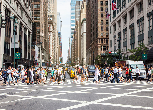 Pedestrians on zebra crossing, New York City, USA