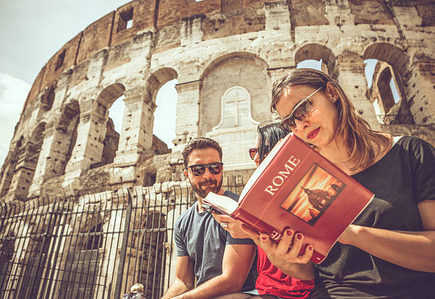istock Tourists with a guide in front of the Coliseum, Rome 503681428