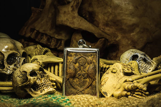 istock small buddha with human skull still life background 503681556