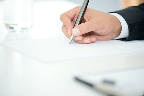 istock Man Signing Contract Paper 503683660