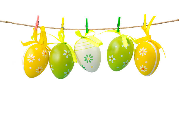 istock Colorful easter eggs hanging on a rope, isolated on white background 503684356