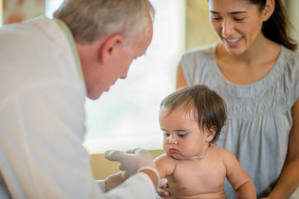istock Baby Girl Getting Her Shots 503689852