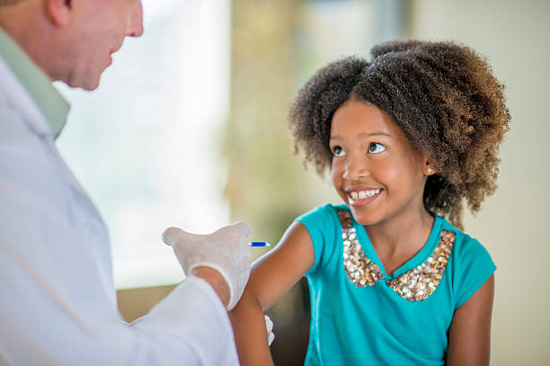 istock Little Girl Getting the Flu Vaccine 503689976