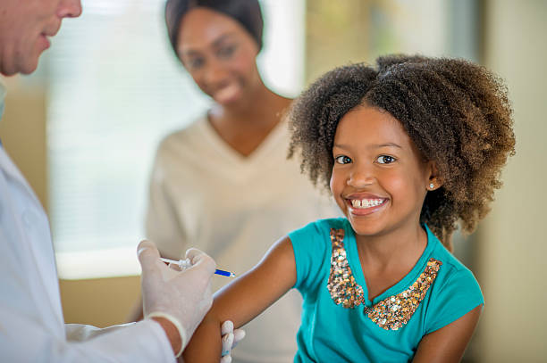 Little Girl Bravely Getting a Shot