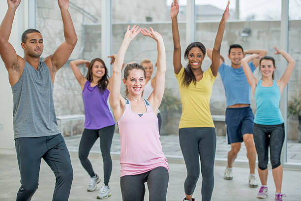 istock Young Adults Exercising Together 503691592