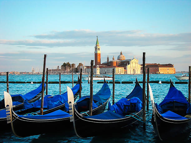 istock Moored gondolas and San Giorgio di Maggiore 503693106